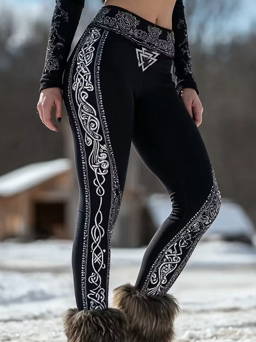 Rennonlinjaiset legginsit, joiden kuvituksena on vintage viikinkien ja pohjoismaiden tyyliä esittelevä taidepainatus