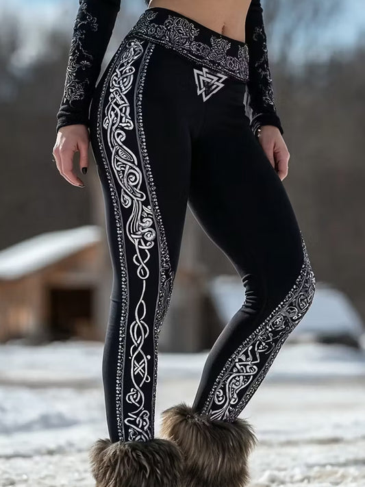 Rennonlinjaiset legginsit, joiden kuvituksena on vintage viikinkien ja pohjoismaiden tyyliä esittelevä taidepainatus