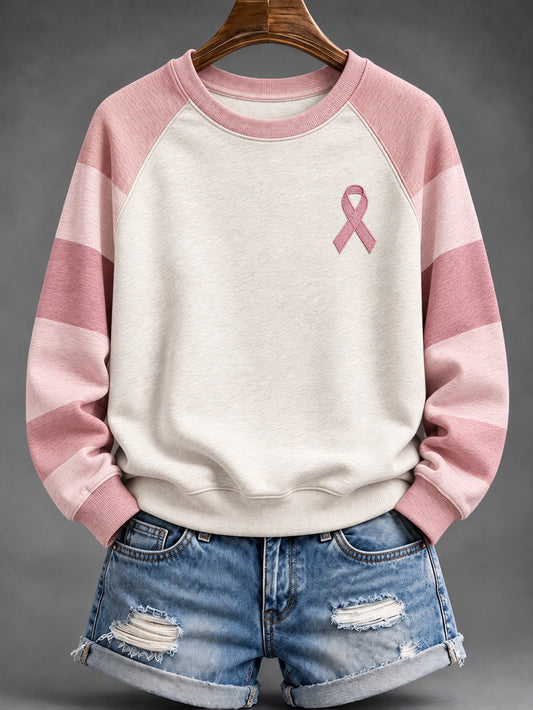 Naisten vaaleanpunainen raidallinen ja vaaleanpunainen hyväntekeväisyys Ribbon kuvio Casual Raglan hiha Sweatshirt